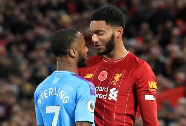 Raheem Sterling and Joe Gomez clash while on Engla