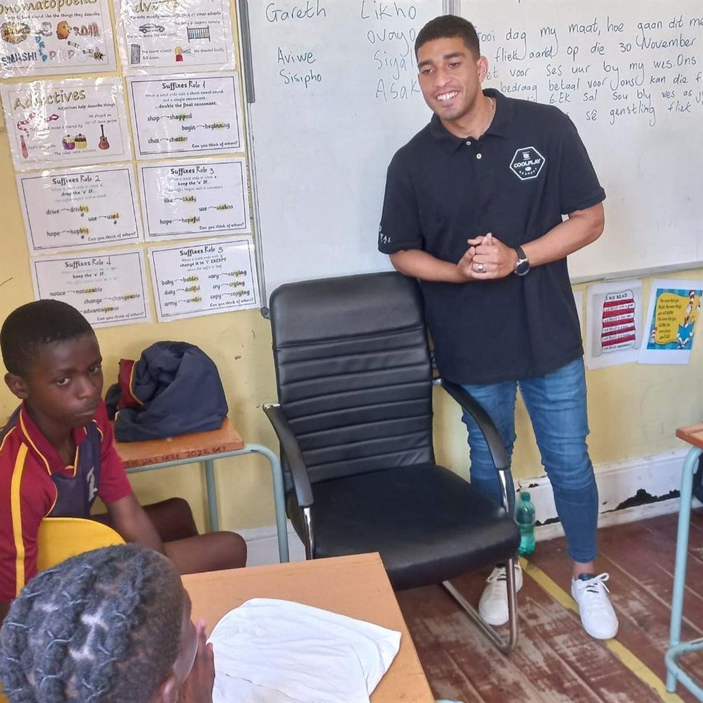 Travis Graham speaking to the learners at Zonneblo