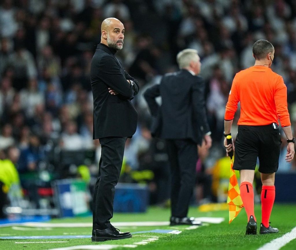 Manchester City head coach, Pep Guardiola's Champi