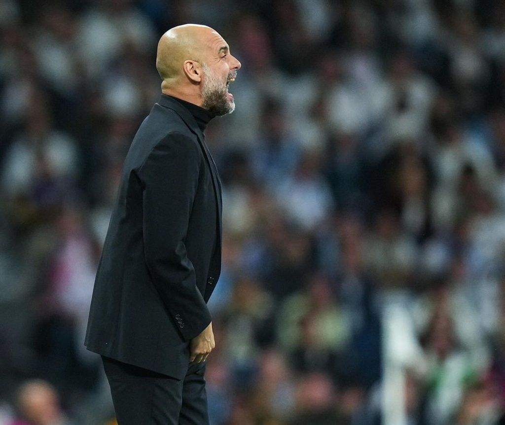 Manchester City head coach, Pep Guardiola's Champi